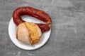 typical portuguese smoked sausage chourico with corn bread Royalty Free Stock Photo