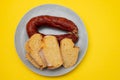 typical portuguese smoked sausage chourico with corn bread Royalty Free Stock Photo