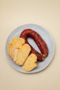 typical portuguese smoked sausage chourico with corn bread Royalty Free Stock Photo