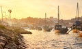 Typical portuguese wooden boats, called `barcos rabelos `transporting wine barrels on the river Douro with view on Villa Nova de