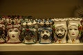 Typical pottery with human heads in shop in Sicilia, Italy
