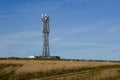 A typical radio and mobile phone network telecommunications tower situate in farmland near Groomsport in County Down, Northern Ire Royalty Free Stock Photo