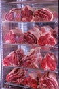 Raw dry aged Bistecca Alla Fiorentina, T-Bone or Porterhouse Steak at the entrance of a restaurant in Florence, Italy