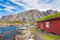 Typical red rorbu fishing hut in village Nusfjord Royalty Free Stock Photo