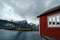 Typical red rorbu fishing huts with sod roof on Lofoten islands in Norway Royalty Free Stock Photo