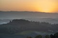 Typical for the region tuscan farm house, hills, vineyard. Italy