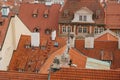 Typical roofs in Prague. Top view - roofs with red tiles in old buildings in Prague. Europe. Royalty Free Stock Photo