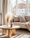 Typical Scandinavian, hygge home interior design with a cozy sofa and blanket. Royalty Free Stock Photo