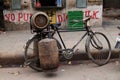 A typical scene of old bike transporting gas bottles to the restaurants in Delhi