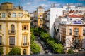 Typical Seville street, sunshine and blue sky