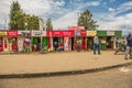 Typical shopping street scene with pedestrians in Naivasha, Kenya