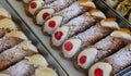 typical Sicilian dessert from southern Italy called CANNOLO SICILIANO filled with ricotta cheese candied cherry