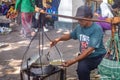 a typical Sidoarjo food seller named Lontong Kupang who is serving customers