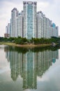 Typical Singapore highrise public housing estate beside river.