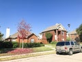 Typical single family home in Texas, America with bright red col Royalty Free Stock Photo