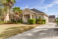 Typical Single Floor American House with Front Yard and Spacious Driveway Exterior Street View Royalty Free Stock Photo