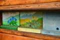 Typical slovenian apiary with unique beehive panels.