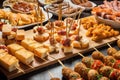 Typical snack of Basque Country, pinchos or pinxtos skewers with small pieces of bread, sea food, eggs, cheese, Royalty Free Stock Photo