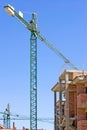 Typical Spanish building site with half built property and crane