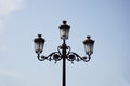 Typical Spanish decorated street lamp and lantern as a symbol of antiquated Spanish design and architecture Royalty Free Stock Photo