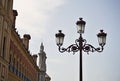 Typical Spanish decorated street lamp and lantern as a symbol of antiquated Spanish design and architecture Royalty Free Stock Photo