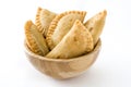 Typical Spanish empanadas in bowl isolated