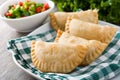 Typical Spanish empanadas on wood