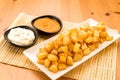 Typical Spanish food, potatoes with alioli sauce and brava sauce. Royalty Free Stock Photo