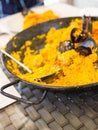 Typical Spanish half-eaten paella Royalty Free Stock Photo