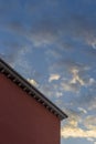 Typical spanish roof and house in Granada, at sunset, with cloudy sky in the background