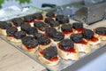 typical spanish tapas with blood sausage on a slice of bread (morcilla Royalty Free Stock Photo