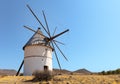 Typical Spanish windmill on a field in Andalusia. Royalty Free Stock Photo