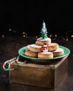 Typical spansih Christmas cookies Polvorones, mantecados, with almonds on dark wooden background with copyspace. Christmas and New Royalty Free Stock Photo