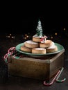 Typical spansih Christmas cookies Polvorones, mantecados, with almonds on dark wooden background with copyspace. Christmas and New Royalty Free Stock Photo