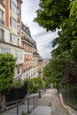 Typical stairs and Haussmann buildings in Montmartre in Paris Royalty Free Stock Photo