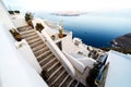 A typical stairway situated in the village of on the greek island of Santorini. Romantic vacation by the sea Royalty Free Stock Photo