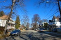 Typical Street in New Jersey with parked cars next to the sidewalk on a sunny day