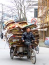 Typical street scene Shanghai. Such a heavy load of carton.