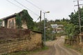 Typical street with yellow gas pipes and typical houses in the town of Hadrut part of the Janapar Trail in Nagorno Karabakh in the Royalty Free Stock Photo