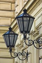 Typical stylish lanterns on 19th century neoclassic building dominant in Vienna Royalty Free Stock Photo