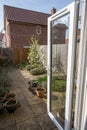 Typical suburban back garden from UK housing estate. Royalty Free Stock Photo