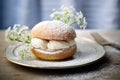 Typical Swedish semla with sweet cream. Generative AI