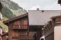 Typical Swiss Wooden chalets amid magnificent mountainsin canton of Valais, Switzerland in summer