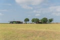 Typical Texas farm house with variety of agriculture machinery and storage Royalty Free Stock Photo