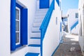 Typical traditional beautiful Greek street in white and blue sty Royalty Free Stock Photo