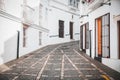 Typical traditional white house walls and Pedestrian Street Pavements in Andalusia Spain - Vejer de la Frontera