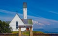 Typical traditional white lutheran church (HallgrÃÂ­mskirkja ÃÂ­ SaurbÃÂ¦, HvalfjarÃÂ°arsveit), West Iceland