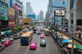 Typical Traffic with Buses, Taxis and Other Cars along an Urban