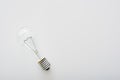 Light bulb, isolated. Realistic photo image. Typical tungsten light bulb in off-state