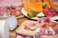 Typical Tuscany cuisine with prosciutto, cheese and fruit